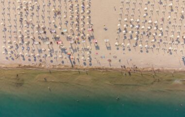 Aerial View Of People Crowd Relaxing On Beach In Albena, Bulgaria